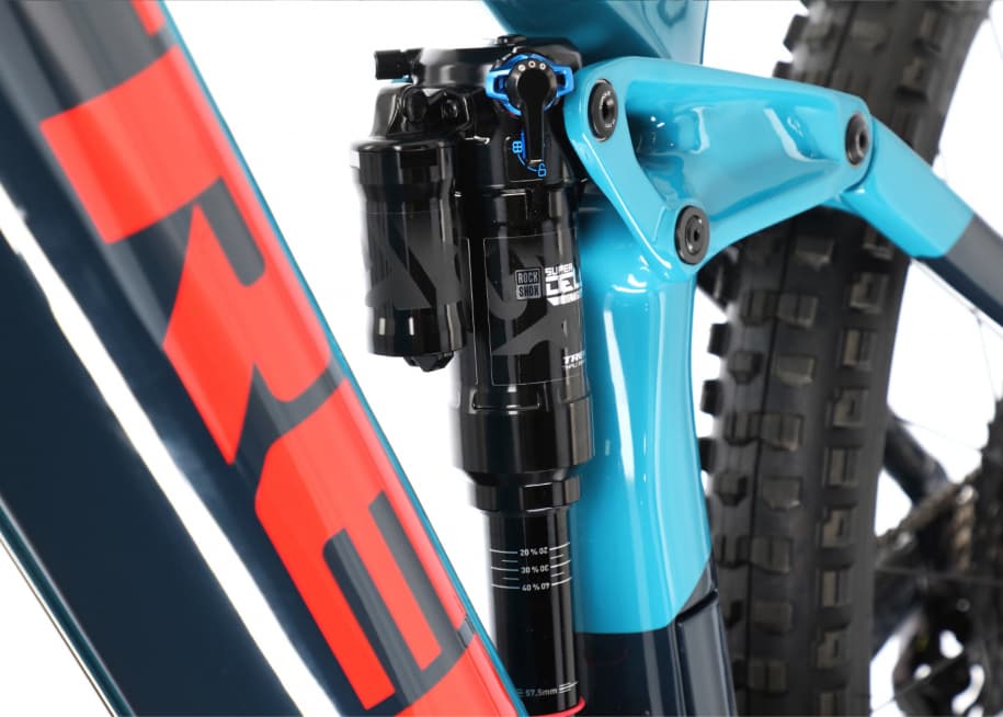 Turquoise bike - wheel detail and full suspension system - packshot