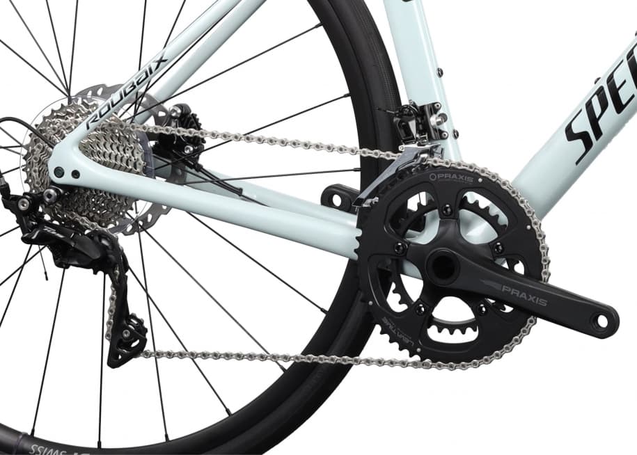 White racing bike detail of chain packshot