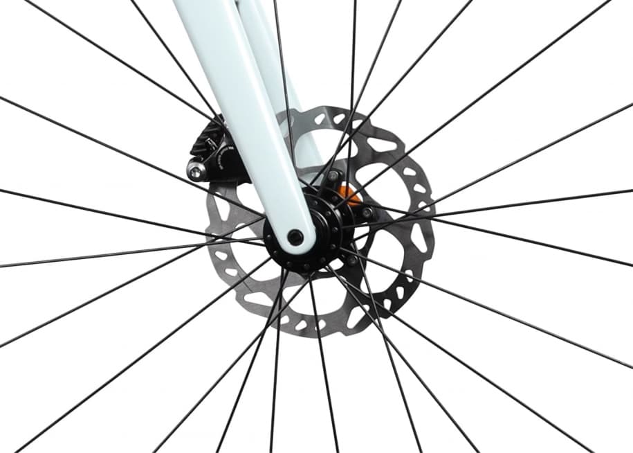 White racing bike detail brake and hub packshot